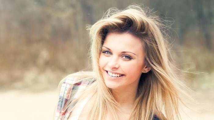 blonde woman smiling