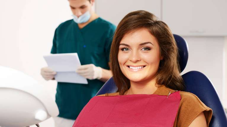 woman in a dental chaird in Smyrna, GA 33080
