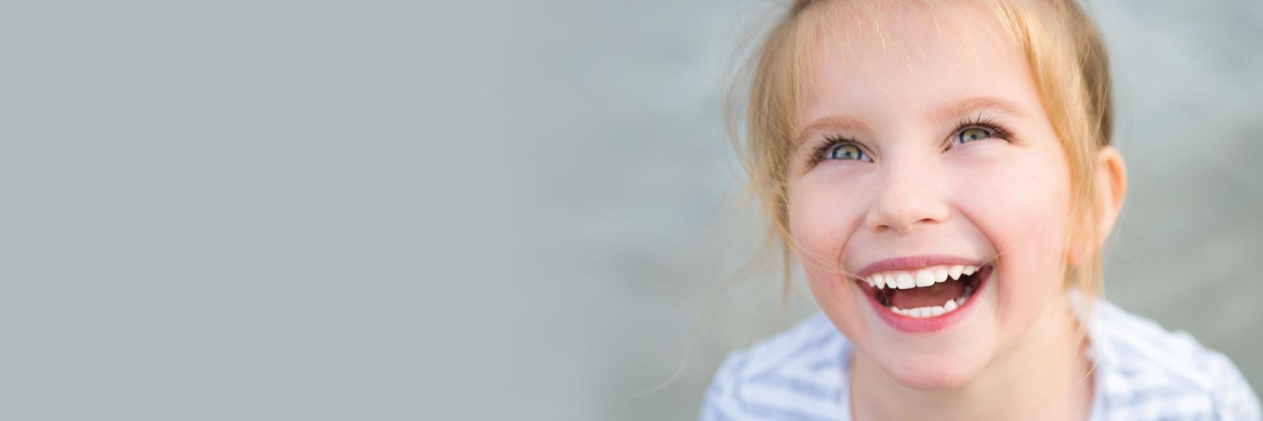 Young child smiling l family dentistry smyrna ga