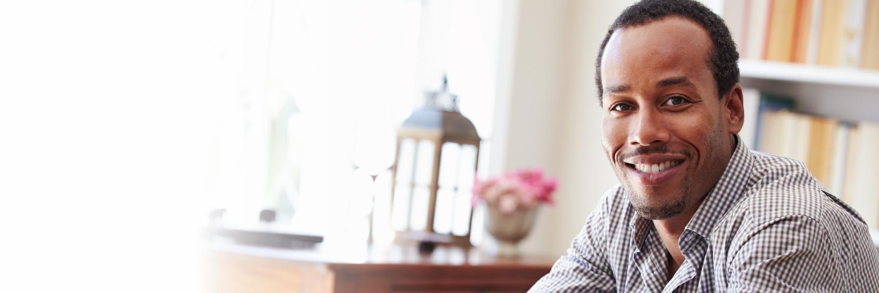 man with mustache smiling l dental crowns smyrna ga 